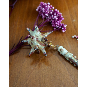 cream and dried blood ear flail - buckle