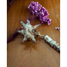 cream and dried blood ear flail - buckle