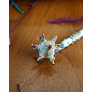 cream and dried blood ear flail - buckle