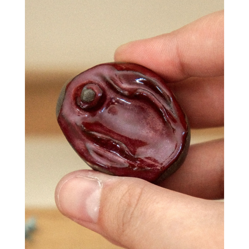 red vulvistone - worry stone