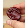 red vulvistone - worry stone