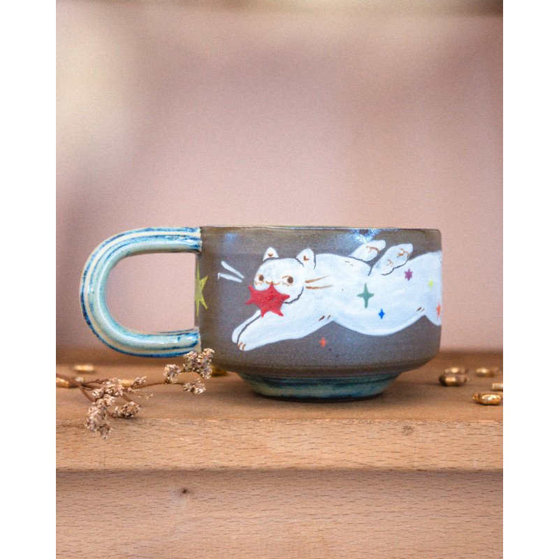 Star-stealing angel cat – mug